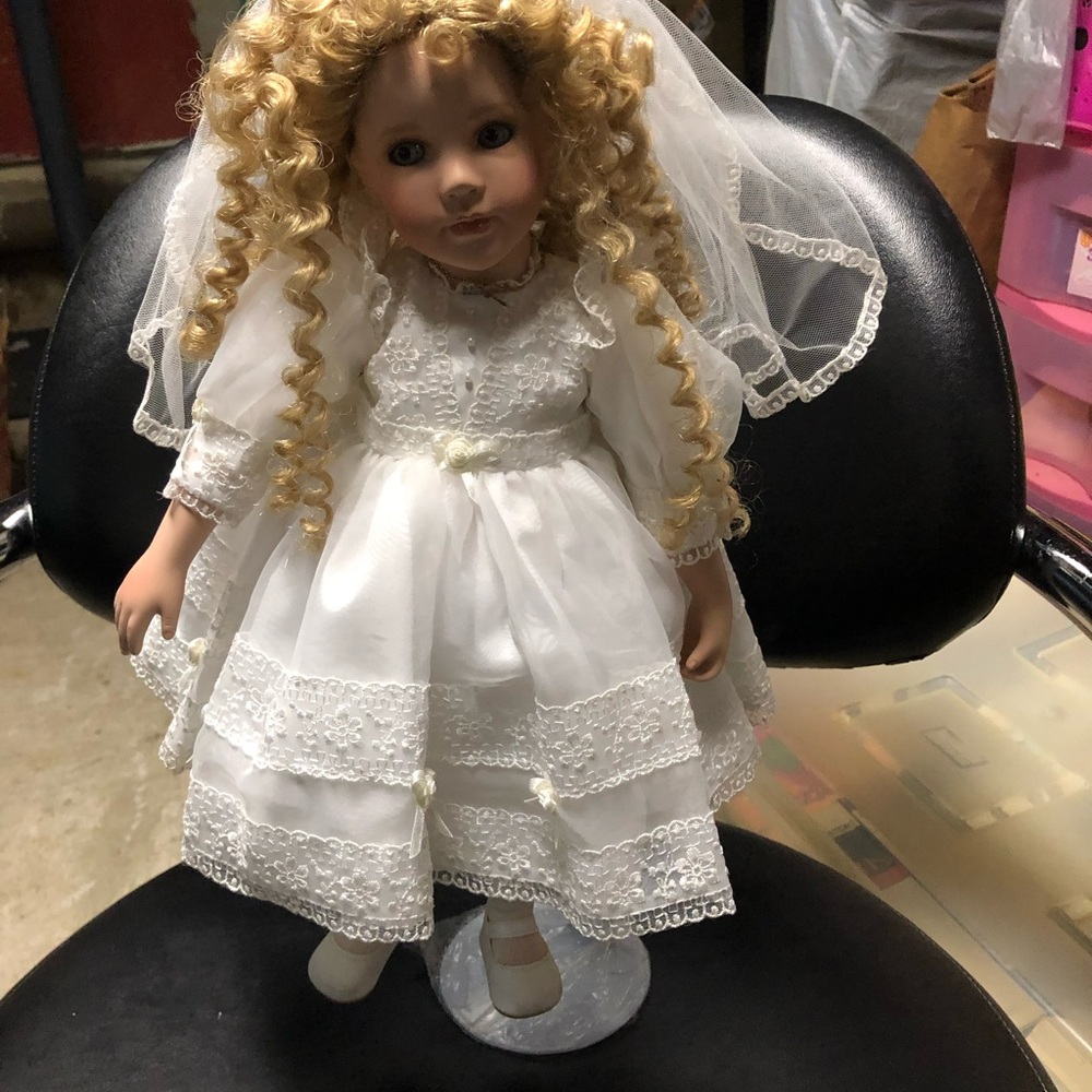 Elegant White Doll with Curly Hair